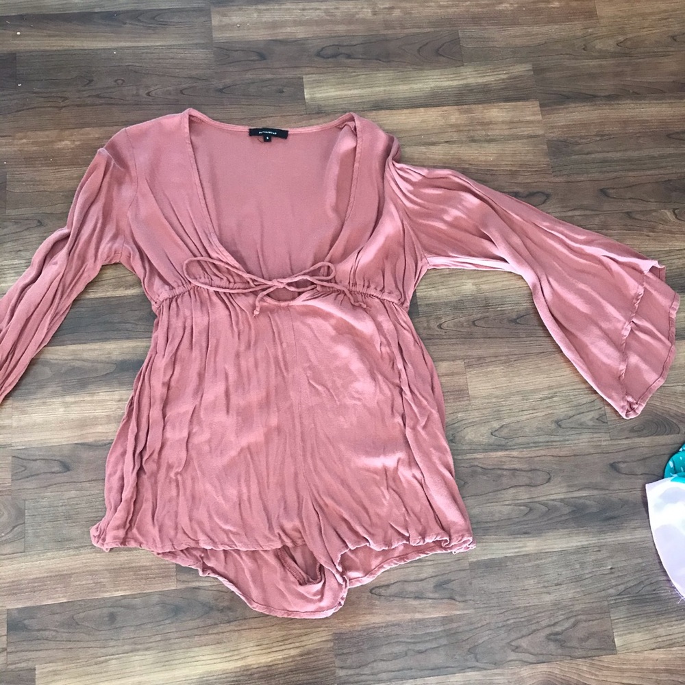 Romper from Princess Polly brand is olivaceous